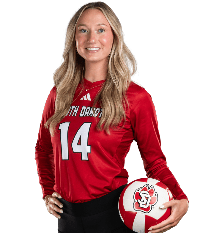 volleyball player posing holding ball