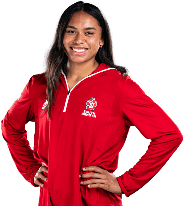 student-athlete posing in team jacket